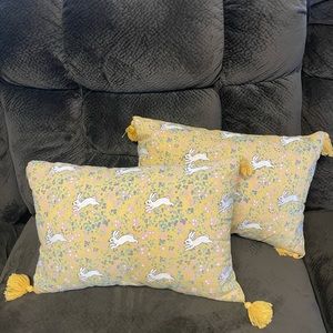 Two decorative floral bunny pillows